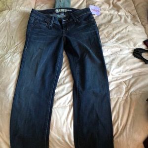 Slightly flared dark denim jeans